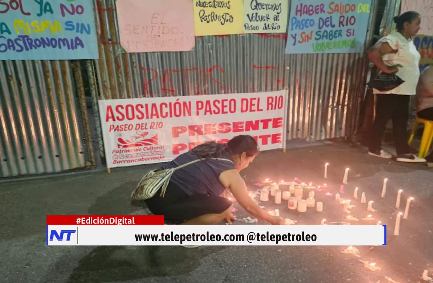 Velatón en el Paseo del Río, comunidad del Paseo del Río, protesta en Barrancabermeja, cocineras tradicionales del Paseo del Río, recuperación del corredor turístico, retorno al Paseo del Río, lucha de familias ribereñas, memoria del Paseo del Río, velas en el Paseo del Río, identidad laboral comunitaria